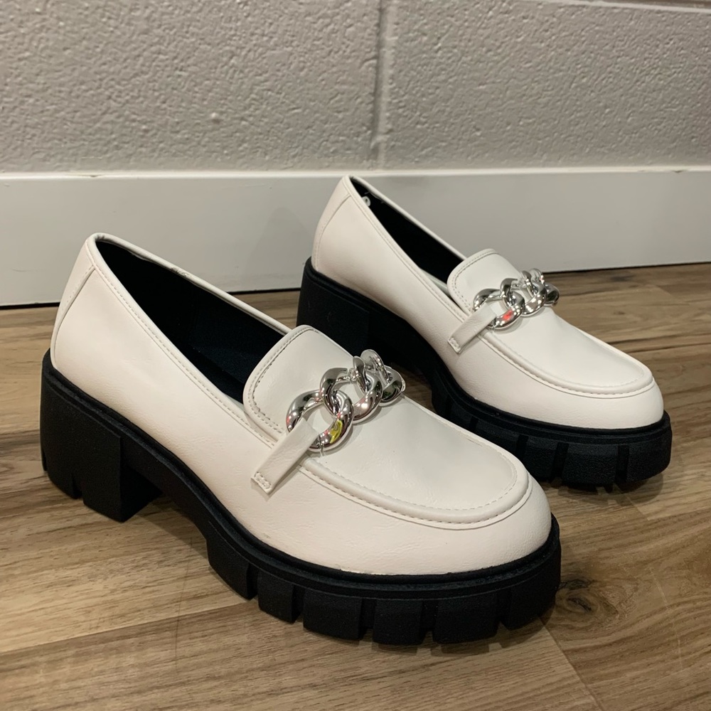 Size 9.5 US women’s platform chunky loafer in white. Brand new, never worn.